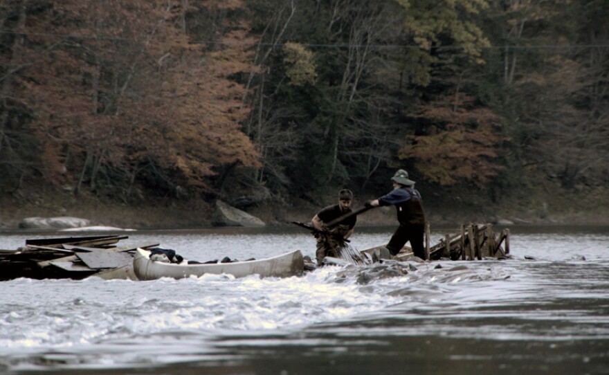 James Prosek at the river with eel fisherman, Ray Turner - Delaware River, Hancock, New York.