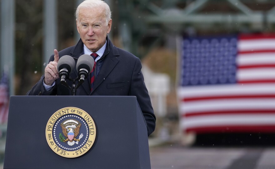 President Joe Biden speaks during a visit to the NH 175 bridge over the Pemigewasset River to promote infrastructure spending Tuesday, Nov. 16, 2021, in Woodstock, N.H.