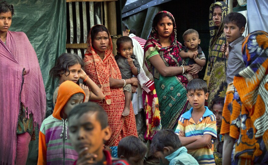 Rohingya Hindu refugees stand outside their makeshift shelters at the Kutupalong refugee camp near Cox's Bazar, Bangladesh, in January. Bangladesh and Myanmar plan to begin the repatriation of hundreds of thousands of Rohingya Muslim refugees who fled from violence in Myanmar.
