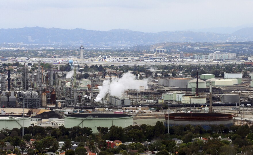 The Standard Oil Refinery in El Segundo, Calif., the El Porto neighborhood of Manhattan Beach, Calif., in the foreground, is seen on May 25, 2017.