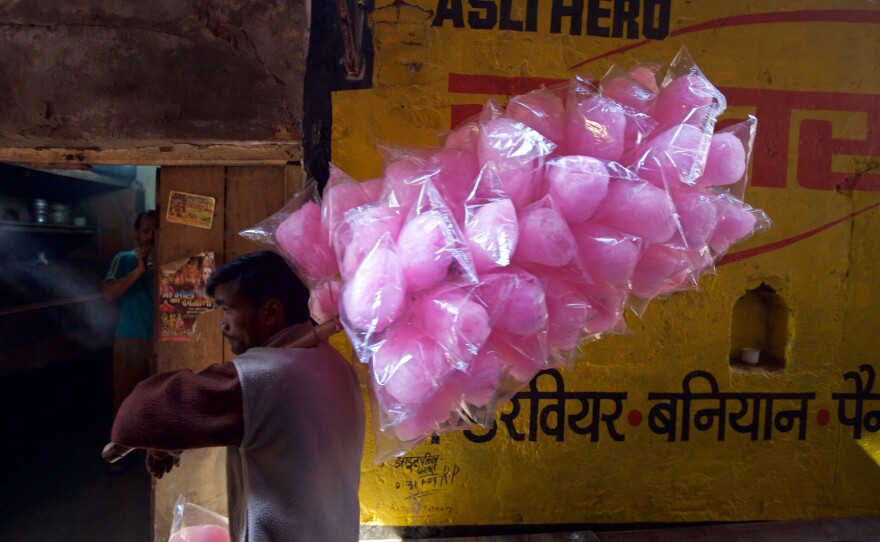 India's sweet tooth has been pegged as a factor in the country's rising rate of diabetes. Above: a cotton candy vendor in Haridwar.