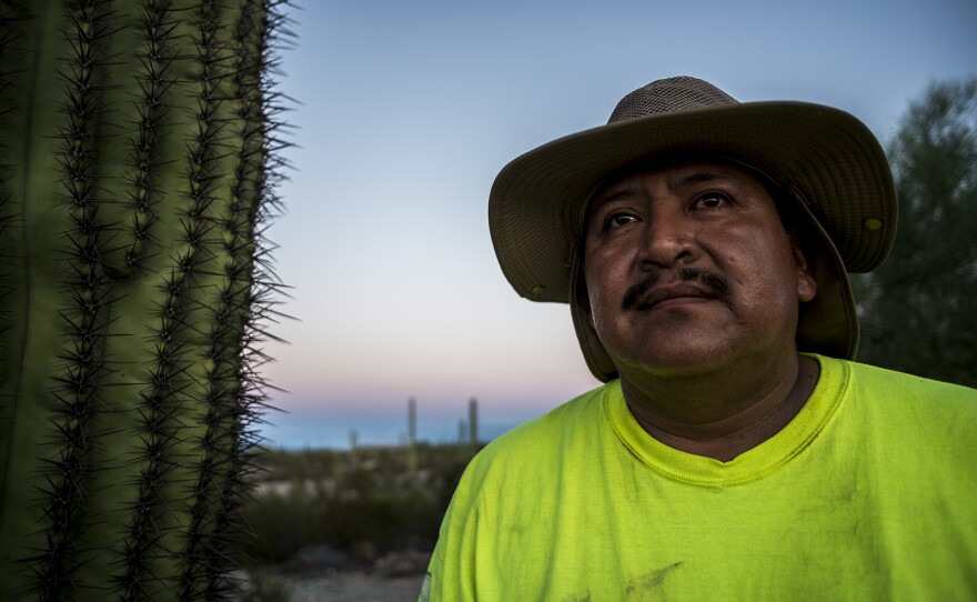 Ely Ortiz, founder of Aguilas Del Desierto, poses for a portrait on Aug. 26, 2017, at the base camp outside Ajo, Arizona, where he and nearly two dozen others prepare for daylong treks into the desert to search for missing migrants.