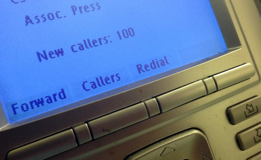 The screen on the phone console at the reception desk at The Associated Press Washington bureau.