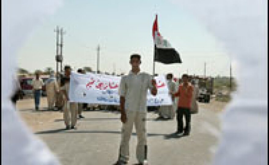 Demonstrators asked the government and coalition forces for better security in the neighborhood.