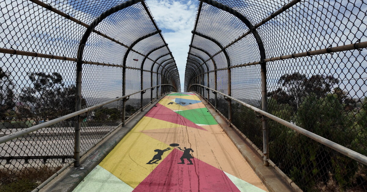 Can glow-in-the-dark paint make a pedestrian bridge safer? Caltrans thinks so