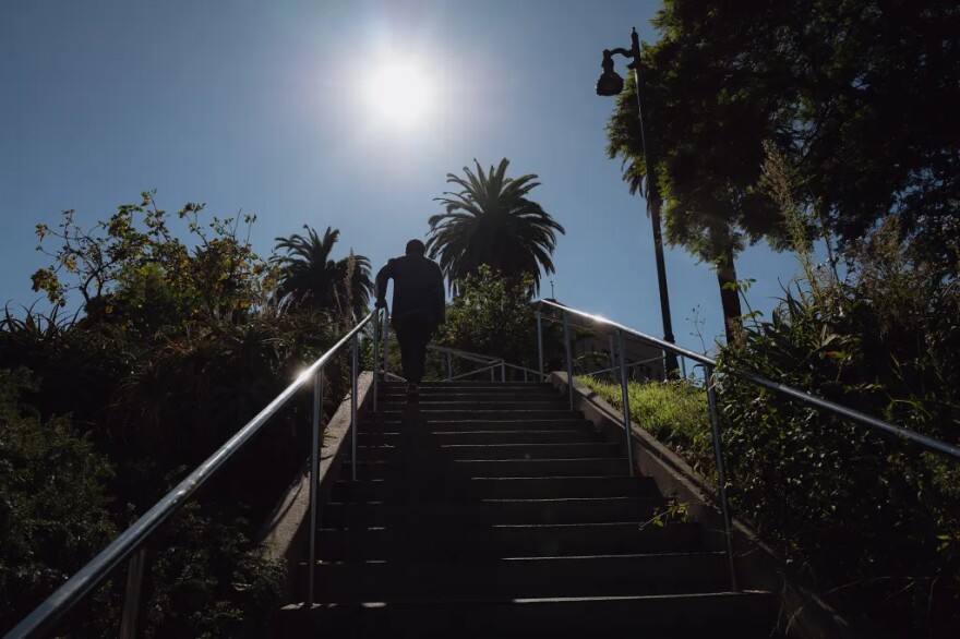 Will Rose walks to a park near his home in San Pedro, which has become a place of refuge for him, surrounded by greenery and nature, on Oct. 16, 2025.