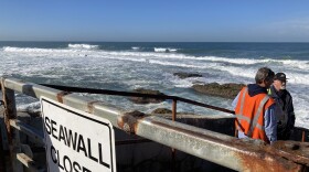 The seawall is closed as big waves hit the La Jolla coast on Jan. 4, 2024