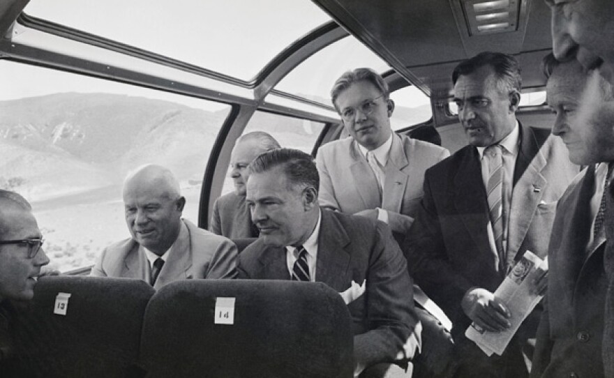 En route from Los Angeles to San Francisco, Soviet Premier Nikita Khrushchev (left) and his American guide, Ambassador Henry Cabot Lodge (front right) view the scenery on their trip North from Los Angeles to San Francisco Sept. 20th. Behind them are Russian Ambassador to the U.S., M. Menshikov and Khrushchev's son, Sergei (standing right). Over-enthusiatic crowd met the Russian visitor at San Luis Obispo.