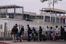 Asylum-seekers from countries that include Mexico, Columbia, Albania, Ukraine, and Russia wait in line for Mexican authorities to be escorted through the El Chaparral border crossing in Tijuana for their scheduled appointments to make their asylum claim, May 12, 2023.