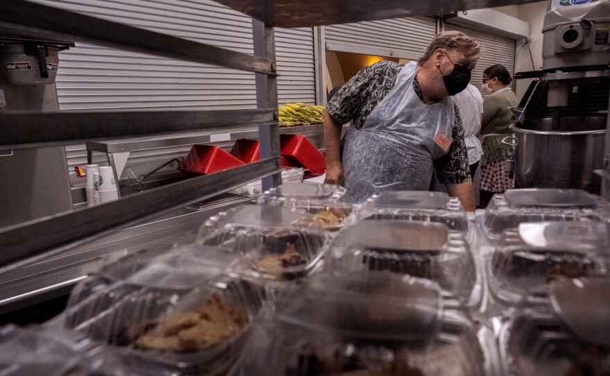 Kitchen staff at Father Joe's in downtown San Diego prepare food for the special Thanksgiving meal, November 24, 2021.