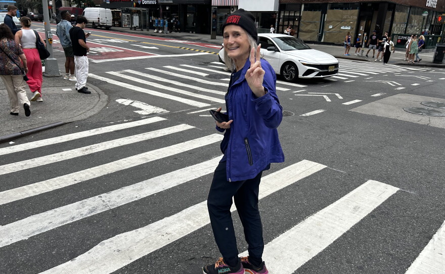 Amy Goodman crosses Seventh Avenue in Manhattan on her way to a screening of Steal This Story, Please!, the documentary chronicling her life and career in independent journalism.
