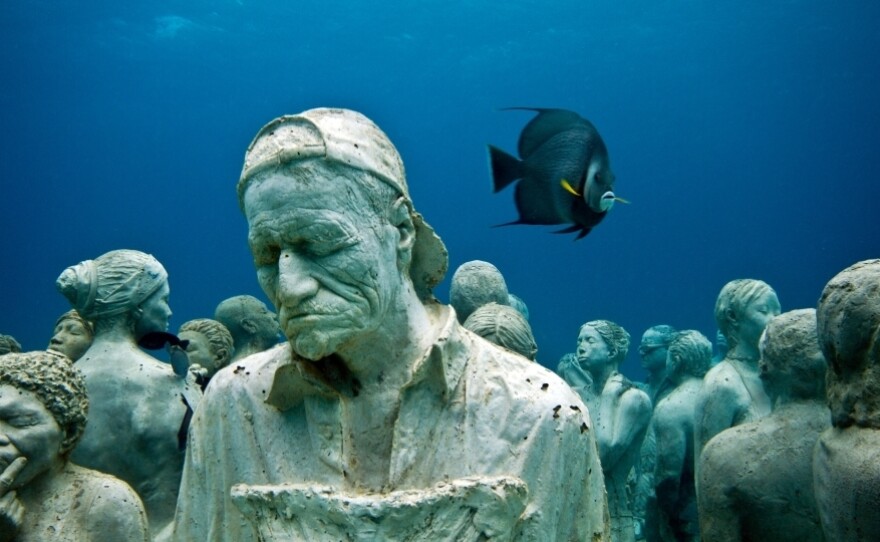 The Silent Evolution, by Jason deCaires Taylor, off the coast of Cancun, Mexico.