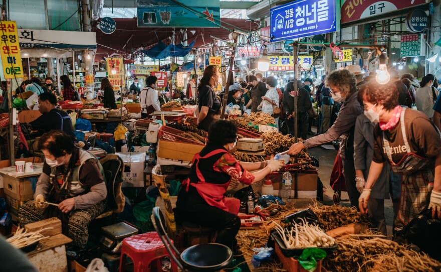 Before the holiday, shoppers buy groceries at Gyeongdong Market in eastern Seoul for the preparation of ritual foods for Chuseok.