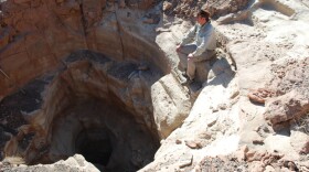 John Grattan sits on the edge of a triple-shaft copper mine, dating from the early Iron Age, during two cutting-edge field investigations that illuminate the legend of Solomon and reveal the source of the great wealth that powered the first mighty biblical kingdoms. 