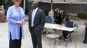 Councilwoman Marti Emerald and Mitch Mitchell, spokesman for the San Diego Food Bank, talk during the kickoff of the food stamp project on June 10, 2010.