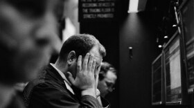 A trader reacts as the market drops; New York Stock Exchange, February 2009.