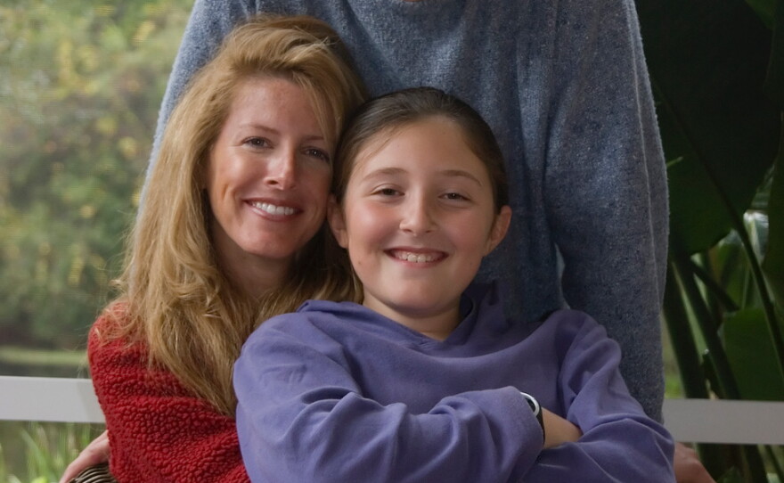 Jonathan Rottenberg, Laura Reiley and their daughter, Sophie.