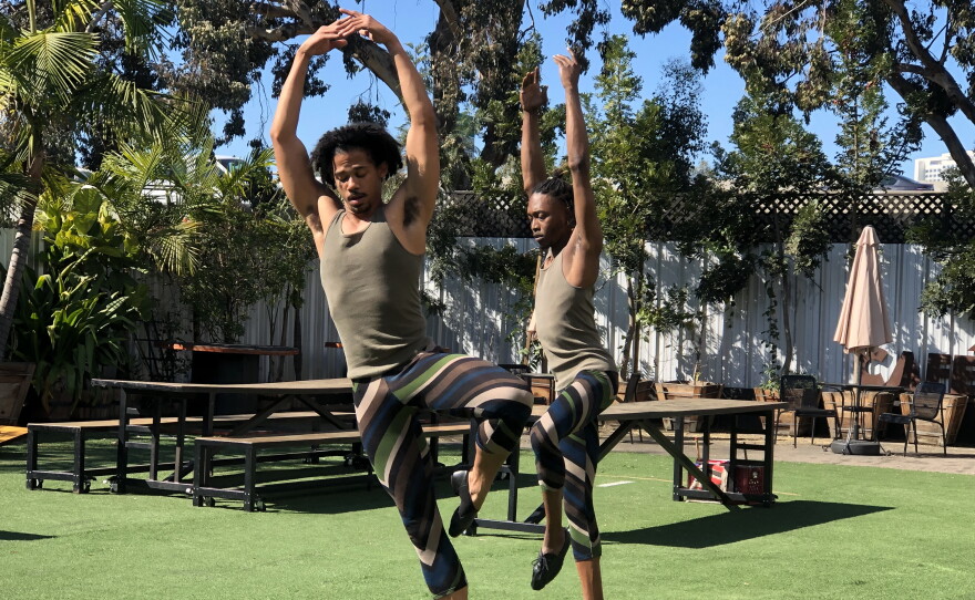 Dancers perform at the grand opening of Café X: By Any Beans Necessary, Feb. 28, 2022.