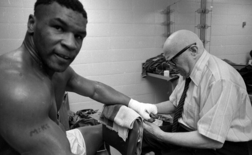 Tyson and D'Amato prepare for the boxer's first pro fight.