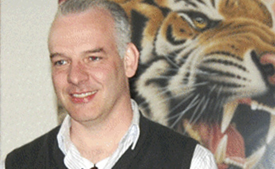 British businessman Neil Heywood, seen here at a gallery in Beijing last April, was found dead in his Chongqing hotel on Nov. 15, 2011. Heywood had ties to Bo Xilai's family, helping organize the education of son Bo Guagua, who studied at the exclusive British boarding schools Papplewick and Harrow.