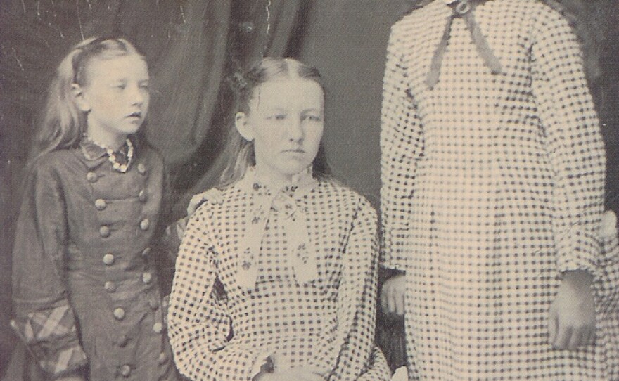 Laura Ingalls (right), with her sisters Carrie (left) and Mary Ingalls.