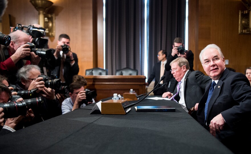 Secretary of Health and Human Services nominee Rep. Tom Price, R-Ga., (right) and Sen. Johnny Isakson, R-Ga., get settled before the start of Price's confirmation hearing Wednesday before the Senate Health, Education, Labor and Pensions Committee.