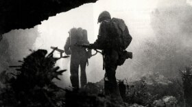 Photo taken during the invasion of Okinawa. In June 1945, after 82 days of intense fighting, US Army and Marines secured Okinawa. The cost was enormous: 12,000 Americans and 70,000 Japanese and Okinawan conscripts lost their lives in a battle that would be remembered as one of the most terrible in the history of warfare.