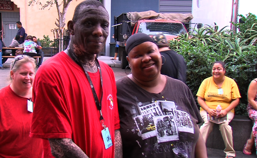 Terrance Livingston and his wife, Pamela Cooks, stand in a lunch line at St. Vincent de Paul Villages in downtown San Diego, Oct. 5, 05.