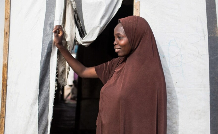 The husbands ran when Boko Haram took over the Nigerian village of Gwoza. Fati, 22, was one of the wives left behind. After five months, she and other women escaped and now live in a camp for displaced people. Because of the stigma of being a Boko Haram abductee, she says she sometimes is "verbally abused" by other residents. But she's found one good friend.