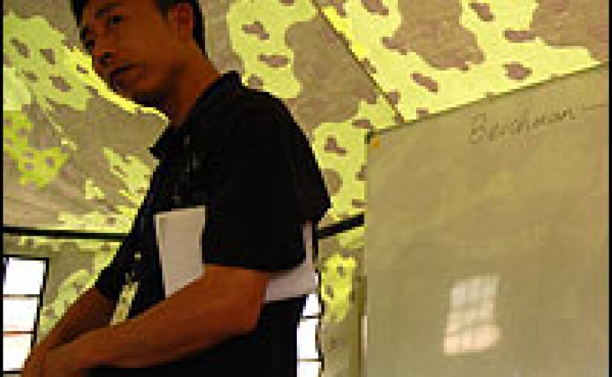 English teacher Zhang Xiaoyong lost his wife and daughter in the quake. He says he wants to take care of the children who did survive.