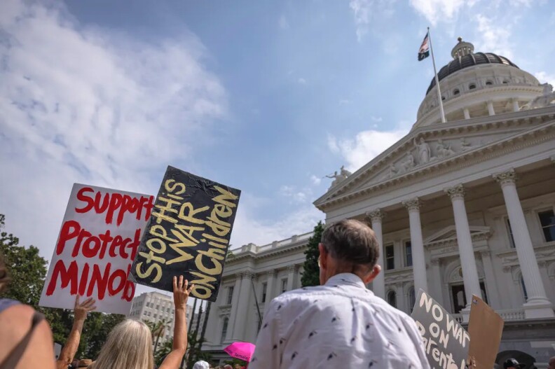 Parents, students and supporters of parental rights rally at the state Capitol in Sacramento on Aug. 21, 2023.