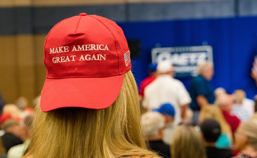 Supporters of former President Donald Trump gather to hear Reps. Marjorie Taylor Greene, R-Ga., and Matt Gaetz, R-Fla., speak last week at a rally in Dalton, Ga.