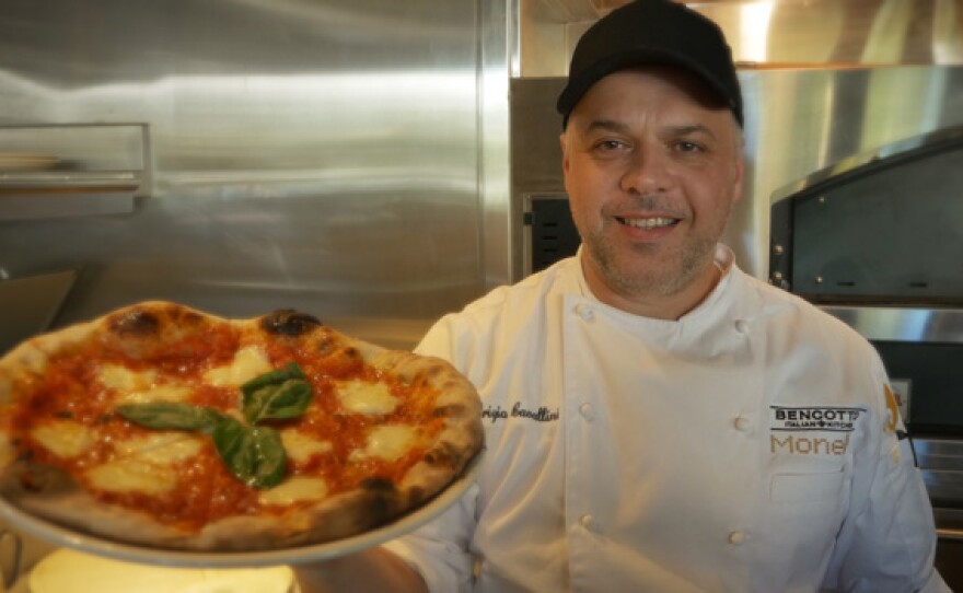 Executive Chef Fabrizio Cavallini prepares a fresh pizza at Bencotto Italian Kitchen in Little Italy.