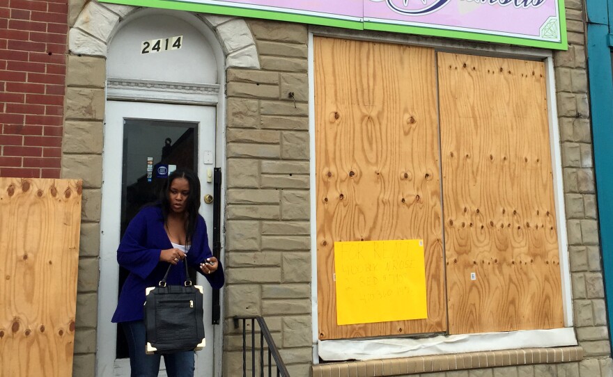 Flawless Damsels was boarded up (shown here in June) after having been looted in riots following the police-custody death of Freddie Gray.