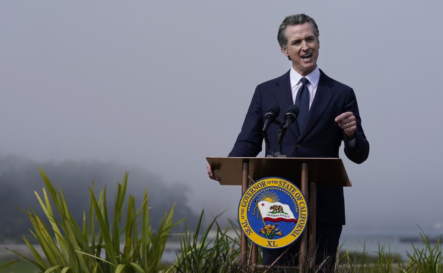 California Gov. Gavin Newsom speaks at the Presidio Tunnel Tops before the signing of a new climate agreement in San Francisco on Oct. 6, 2022. 