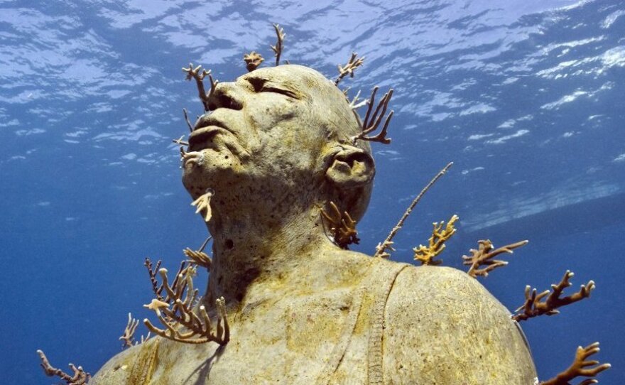 Man on Fire, by Jason deCaires Taylor, off the coast of Cancun, Mexico.