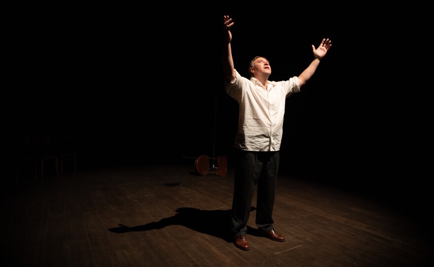 Igor Kytrysh, actor for the Donetsk Regional Drama Theatre of Mariupol, on stage during a rehearsal for their play "Cry of a Nation" at the Uzhhorod municipal theatre on July 14, 2022.