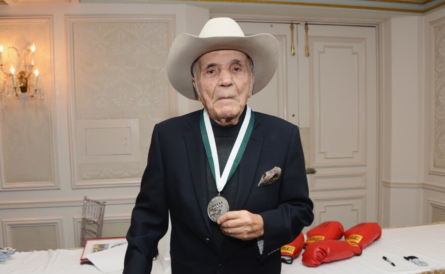Former world middleweight champion boxer Jake LaMotta attends a dinner in New York City in 2012. LaMotta has died at 95.