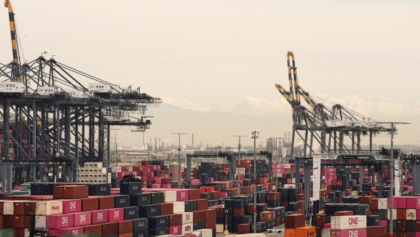 Containers are stacked at the Port of Los Angeles on Friday.