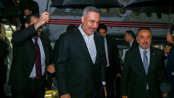 In this photo released by the Pakistan Ministry of Foreign Affairs, Turkish Foreign Minister Hakan Fidan, center, walks toward his car upon arrival to attend a meeting in Islamabad, Pakistan, Saturday, March 28, 2026.