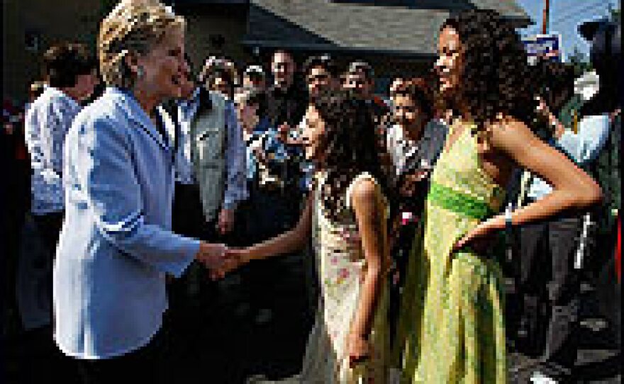New York Sen. Hillary Clinton shakes hands with people, as she visits a polling station on April 22, 2008, in Conshohocken, Pa.