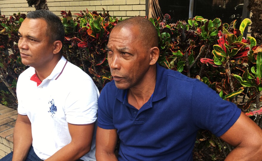 Cuban migrants Arnalbis Rogel (left) and Modesto Morales arrived on a boat in Florida on Sept. 7. Morales was the navigator.