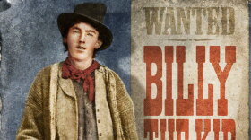 Henry McCarty, alias Billy the Kid with wanted dead or alive poster.