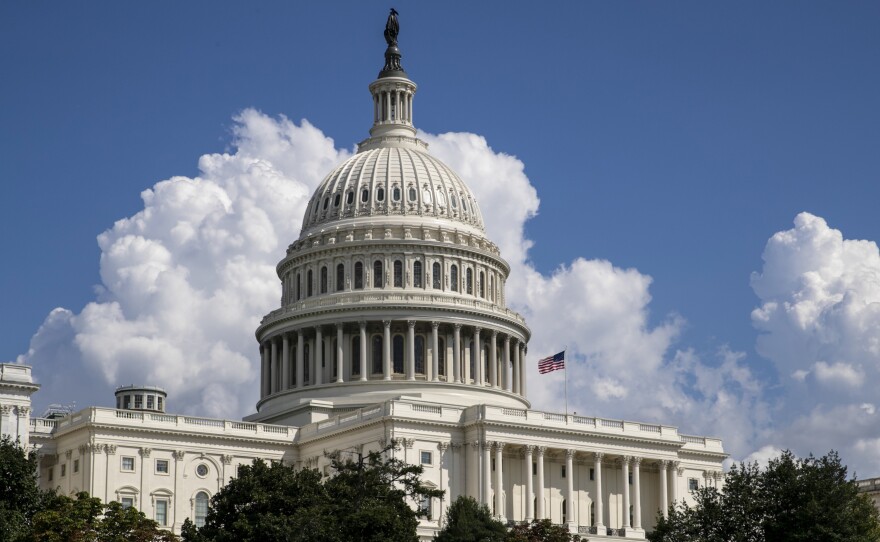 The federal budget deficit is expected to grow to $960 billion this year, the Congressional Budget Office said.