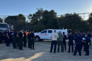 A briefing is being held at the ICP before crews continue to extinguish hot spots on Aug. 18, 2026.