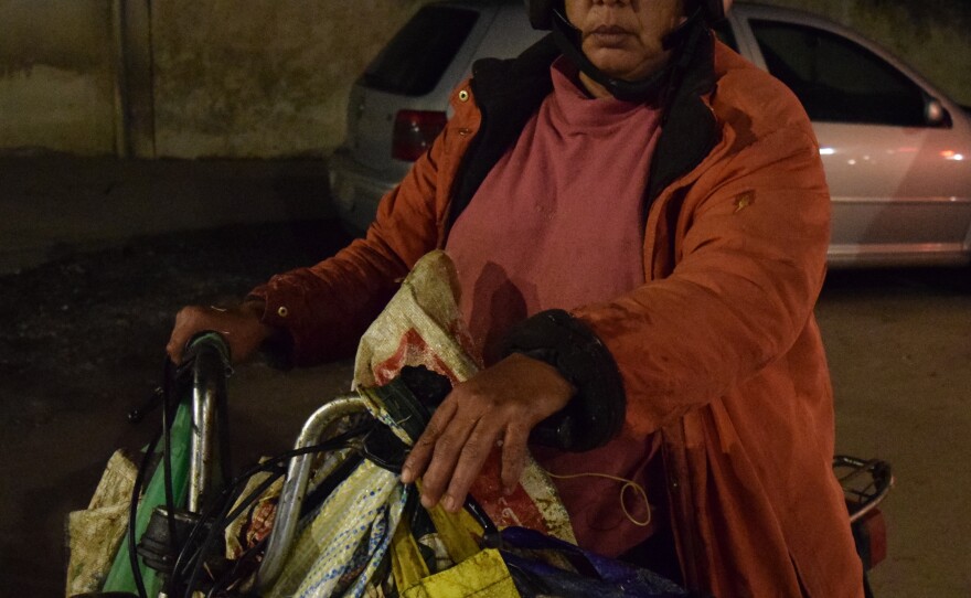 Atika Cherradi drives her motorbike around Rabat disepersing 50lbs of food scraps to the city's stray cats and dogs.