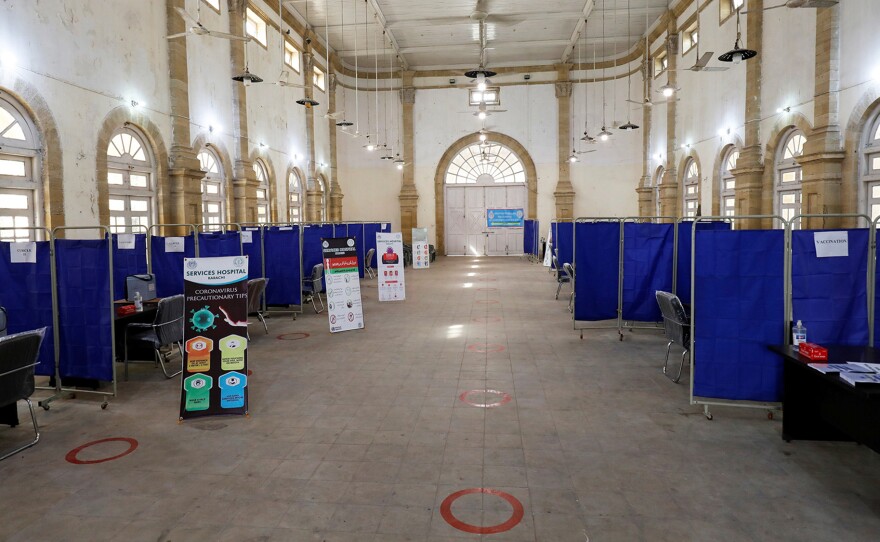 The Khaliq Dina Hall and Library building in Karachi, Pakistan, has been converted into a COVID-19 vaccination center.
