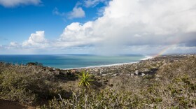 A rainbow shines over La Jolla during intermittent sunshine between storms, Jan. 7, 2016.