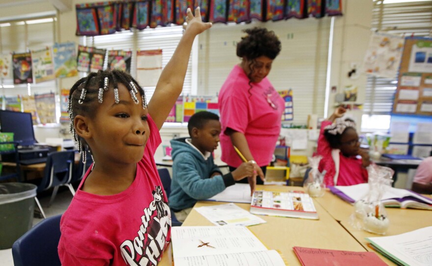 Walton Elementary second grader Janiya Smith eagerly asks to be called on in her class at the Jackson, Miss., school. Voters in the state failed to guarantee adequate funding for Walton and Mississippi's other public schools.