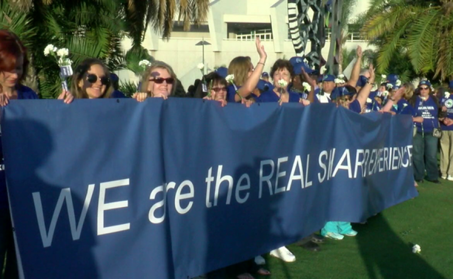 Nurses for Sharp HealthCare rally at the San Diego Convention Center amid contract negotiations with the company, Oct. 6, 2016.